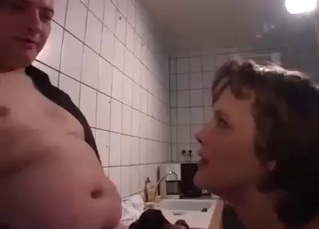 Mom gives a good blowjob for a horny son