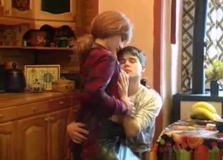 Young son is playing with his mom's tits